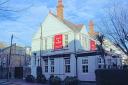 Coat and Badge in Putney (Jim Linwood)