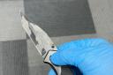 During the day of action, a quantity of alcohol and a locking knife were seized by officers.