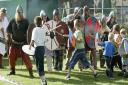 pix by Andy Horsfield - 21/08/04 - cReg15Christchurch regatta on the Quay - Fafnir's bane (Viking, Saxon, Norman and Celtic re-enactment society)...some of the audience repel the invaders..