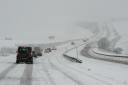 Motorists struggling on the A35 at Askerswell as heavy snow falls.  21st November 2024.  Picture Credit: Graham Hunt Photography