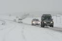 Motorists struggling on the A35 at Askerswell as heavy snow falls.  21st November 2024.  Picture