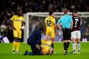 Crystal Palace's Adam Wharton goes down with an injury during the Carabao Cup fourth round match at Villa Park, Birmingham. Picture date: Wednesday October 30, 2024.