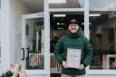 James Rowe from Ground proudly displaying his certificate