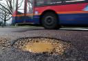 picture by Richard Crease - 17/01/14 -  RC170114bPotholes1 -   words by bmth -   large pothole in Mandale Road , Bournemouth ,  made worse by all the recent rain...COPYRIGHT BOURNEMOUTH DAILY ECHO.