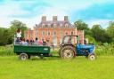 Vintage tractor in front of St Giles House