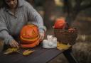 A child carving a pumpkin. Credit: Monstera from Pexels