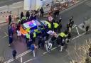 Video grab image courtesy of Conor Noon of clashes between police and protesters in Westminster as officers use a police vehicle to escort Labour leader Sir Keir Starmer to safety. Picture taken on Monday, February 7.