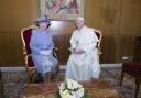 The late Queen Elizabeth II with Pope Francis.