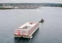 The Bibby Stockholm barge arriving in Falmouth in May