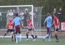 Tommy Stagg, second right, fires home Weymouth's third goal