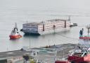 The Bibby Stockholm arriving at Portland Port