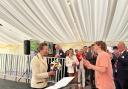 Princess Anne received flowers from a student at Millie College