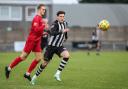 Will Fletcher, centre, has joined Wimborne Town after opting to leave Dorchester