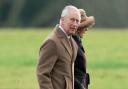 The King smiled and waved to the public as he arrived for the church service today