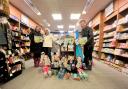 (Left to right) Lisa Esposito, Laura Gilbert, and Warren Glynn invited the children of Chewton Common Playgroup to Bookends for World Book Day.