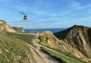 The Dorset and Somerset Air Ambulance landed at the top of Durdle Door