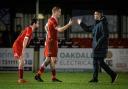 Harvey Wright (centre) came in for specific praise from manager Steve Tulyl