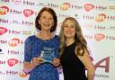 Photograph shows Veronica Ryder, left, receiving her award from Charlotte Smith from PPL