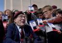 D-Day veteran Bill Gladden, 6th Airborne Army Recce Regiment RAC meets local French schoolchildren at the British Normandy Memorial at Ver-sur-Mer in France ahead of the 79th anniversary of the D-Day landings. Picture date: Monday June 5, 2023.