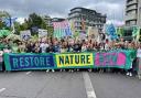 Extinction Rebellion Wimborne marched with 100,000 others on the streets of London.