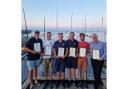 Six members of Swanage RNLI with their awards