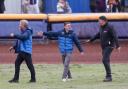 Danny Ford and Rob Godfrey exchanged words after a mechanical fault flooded part of Poole's track