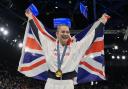 Bryony Page of Britain celebrates after winning the gold medal during the women's trampoline finals in Bercy Arena at the 2024 Summer Olympics, Friday, Aug. 2, 2024, in Paris, France. (AP Photo/Charlie Riedel).