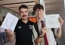 Students at Bournemouth School  receive their A level results. Ben Coles and Dan Moss.