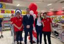 Store manager Ben Hunt (middle left) with deputy manager Amelia Hawkins (middle right) at the grand opening