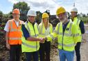 Eco's Peter Hardy (second left) shakes hands with Cllr Andy Hadley (second right) watched by BCP Council's David Rickards, Kate Langdown and Eco MD Justin Dampney. Picture: Andy Diprose.