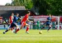 Harry Thomas (Poole) on the ball against Wimborne Town on the 26th August 2024.