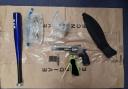 Gun discovered in a rucksack also containing drugs and a machete sheath