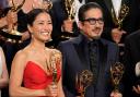 Anna Sawai, left, winner of the award for outstanding lead actress in a drama series for Shogun, and Hiroyuki Sanada, winner of the awards for outstanding lead actor in a drama series, and outstanding drama series for Shogun pose in the press room during