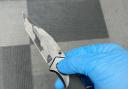 During the day of action, a quantity of alcohol and a locking knife were seized by officers.