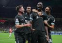 Ibrahima Konate, second right, celebrates after scoring Liverpool’s equaliser (Fabrizio Carabelli/PA)