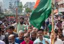 Protesters demand a democratic transition through an election in Dhaka (Rajib Dhar/AP)