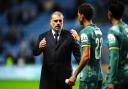 Ange Postecoglou (left) shakes hands with matchwinner Brennan Johnson (Mike Egerton/PA)