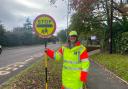 Mrs Baldwin in her lollipop lady uniform