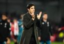 Bournemouth manager Andoni Iraola applauds the fans after the final whistle at Brentford