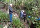 National Trust staff monitor stream flow.