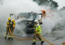 Firefighters extinguish a bin lorry fire in Somerford, Christchurch