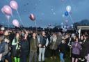 Family and friends of Jade Clark release balloons in tribute