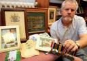 DISTINCTION: Lester Brown with some of his grandad’s memorabilia