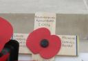 SYMBOL: Wreath of poppies placed at La Ferte Sous Jouarre Memorial in France by Jenny Young for men of Bournemouth killed in WW1. Include Private L A Beare and names of five other Bournemouth soldiers