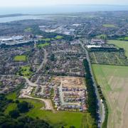 SITE: An aerial picture of Roeshot Hill, where a gravel extraction operation will take place and, inset, traffic on the A35