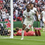 England's Raheem Sterling celebrates after scoring his side's opening goal during the Euro 2020 soccer championship round of 16 match between England and Germany, at Wembley stadium in London, Tuesday, June 29, 2021. (Andy Rain, Pool via AP).