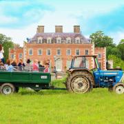 Vintage tractor in front of St Giles House