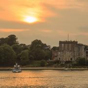 Sun setting over Brownsea Island Castle in Poole Harbour captured by Echo Camera Club member Jeremy Mayes..