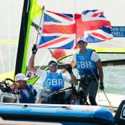 Portland's Stuart Bithell, left, and Dylan Fletcher celebrate their Olympic gold at Tokyo 2020