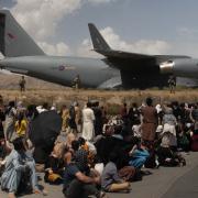 Pentagon confirm explosion at Kabul airport as thousands flee Afghanistan. (PA)